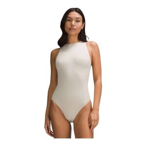 NWOT Lululemon wundermost ultra soft nulu high neck sleeveless bodysuit in bone